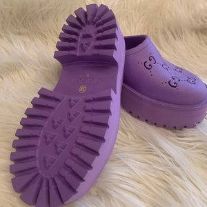 NWOT or box GUCCI mules….  Never worn